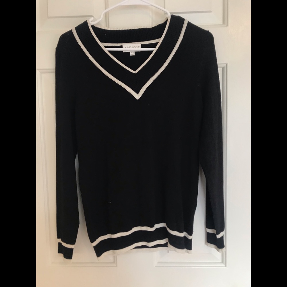 Black sweater with cream accents